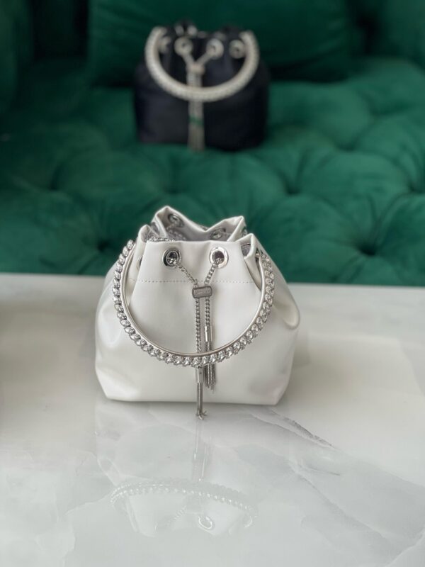 Jimmy Choo Clinch M Drawstring Pouch Bag – At a Glance
