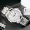 WhatsApp Image 2025-11-18 at 1.20.38 PM elegant stainless steel men’s watch with silver dial and metal strap