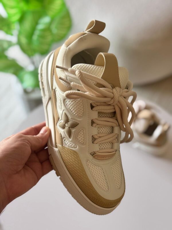 WhatsApp Image 2025-11-18 at 1.23.53 PM Luxury-inspired beige chunky sneakers with mesh upper and 3D floral detailing