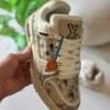 Luxury-inspired beige checkered sneakers for men with cushioned sole and premium design